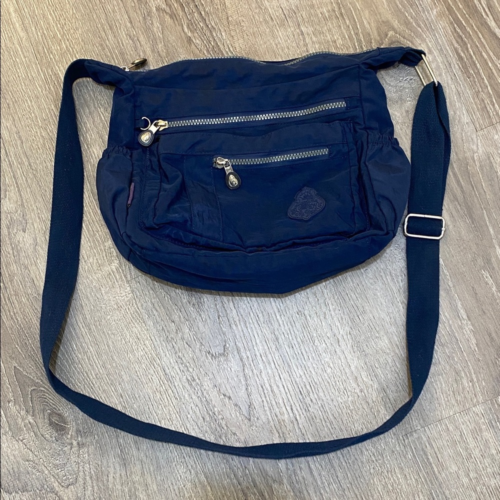 Blue bag with adjustable strap